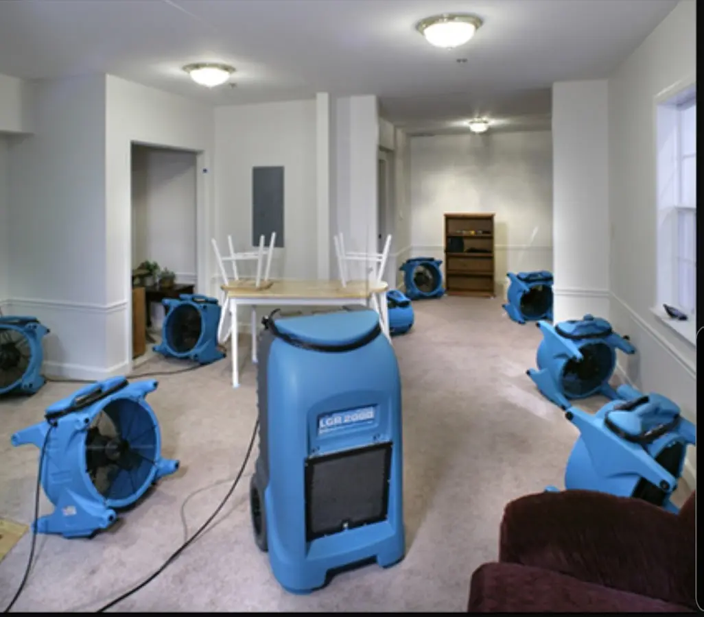 Air movers and dehumidifier setup for Water Damage Restoration in Hutchinson